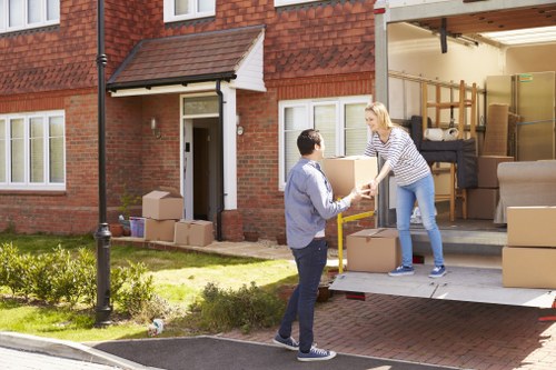 Staff following safe working practices during a move