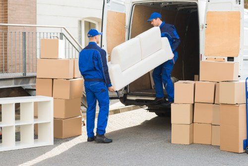 Removal van and moving boxes during a house move in Little Ilford