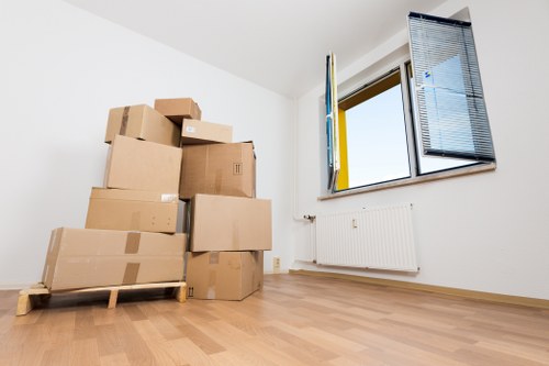 Man and van loading furniture for a local move in Little Ilford